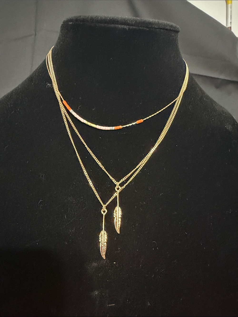 Gold Layered Feather Necklace with Orange Accent